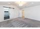 Spacious main bedroom with ensuite bathroom and sliding barn door at 706 S Main St, Whitestown, IN 46075