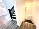 Elegant staircase leading to the upper level of the home at 3442 N Capitol Ave, Indianapolis, IN 46208