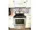 Stainless steel oven and range with microwave above at 3442 N Capitol Ave, Indianapolis, IN 46208