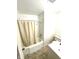 Bathroom with beige tile floor, tub, and shower at 3442 N Capitol Ave, Indianapolis, IN 46208