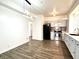 Modern kitchen featuring stainless steel appliances and stylish cabinetry at 3442 N Capitol Ave, Indianapolis, IN 46208