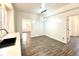 Kitchen dining area with hardwood floors and an open layout at 3442 N Capitol Ave, Indianapolis, IN 46208