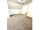 Spacious finished attic bedroom with neutral carpeting at 3442 N Capitol Ave, Indianapolis, IN 46208