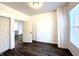 Spacious bedroom with hardwood floors and large window at 3442 N Capitol Ave, Indianapolis, IN 46208