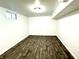 Finished basement room with vinyl flooring at 3442 N Capitol Ave, Indianapolis, IN 46208