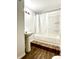 Clean bathroom with pedestal sink and tub shower at 3442 N Capitol Ave, Indianapolis, IN 46208