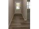 Light and airy entryway with wood-look flooring and neutral wall colors at 3979 Willow Branch Way, Westfield, IN 46062