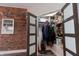 Small closet with shelving and hanging space at 610 N Park Ave, Indianapolis, IN 46204