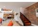 Modern staircase with metal railing leading to upper level at 610 N Park Ave, Indianapolis, IN 46204
