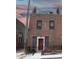 Brick building with rooftop deck and modern accents at 610 N Park Ave, Indianapolis, IN 46204