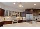 Sleek kitchen featuring stainless steel appliances and marble countertops at 610 N Park Ave, Indianapolis, IN 46204