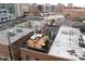Aerial view showcasing a rooftop deck with city views and surrounding buildings at 610 N Park Ave, Indianapolis, IN 46204