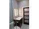 Clean bathroom with a floating vanity, walk in shower, and frosted glass door at 610 N Park Ave, Indianapolis, IN 46204