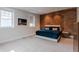 Comfortable bedroom with a plush bed and an exposed brick wall at 610 N Park Ave, Indianapolis, IN 46204