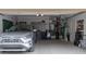 Attached garage with ample space for a vehicle, storage, and additional items at 610 N Park Ave, Indianapolis, IN 46204