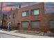 Brick building exterior, featuring multiple windows and landscaping at 610 N Park Ave, Indianapolis, IN 46204