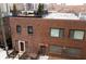 Aerial view of a brick building with rooftop deck at 610 N Park Ave, Indianapolis, IN 46204