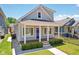 Newly constructed home with a modern exterior and a blue front door at 805 Iowa St, Indianapolis, IN 46203