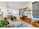 Open living space with hardwood floors, stylish furniture, and built-in shelving at 805 Iowa St, Indianapolis, IN 46203