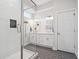 Bathroom with white subway tile and a patterned floor at 805 Iowa St, Indianapolis, IN 46203