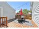 Enjoy grilling and dining al fresco on this spacious deck, complete with string lights and patio furniture at 805 Iowa St, Indianapolis, IN 46203