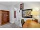 Upper level hallway with bookcase and desk area at 805 Iowa St, Indianapolis, IN 46203