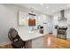Modern kitchen with white shaker cabinets, stainless steel appliances, and quartz countertops at 805 Iowa St, Indianapolis, IN 46203