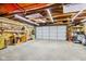Spacious garage with ample storage and a workbench at 805 Iowa St, Indianapolis, IN 46203