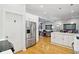 Modern kitchen with white cabinets, stainless steel appliances and breakfast bar at 805 Iowa St, Indianapolis, IN 46203