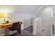 Small home office with wooden desk and chair at 805 Iowa St, Indianapolis, IN 46203