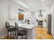 Modern kitchen with white shaker cabinets, stainless steel appliances, and quartz countertops at 805 Iowa St, Indianapolis, IN 46203