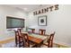 Bright dining room with hardwood floors and a wood dining table at 805 Iowa St, Indianapolis, IN 46203