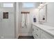 White subway tile shower and double vanity bathroom at 805 Iowa St, Indianapolis, IN 46203