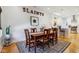 Elegant dining area with hardwood floors and a spacious dining table at 805 Iowa St, Indianapolis, IN 46203