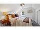 Bright bedroom with a double bed and wooden nightstands at 805 Iowa St, Indianapolis, IN 46203
