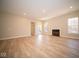 Spacious living room with hardwood floors and fireplace at 7936 Beaumont Green Pl, Indianapolis, IN 46250