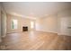 Spacious living room with hardwood floors and fireplace at 7936 Beaumont Green Pl, Indianapolis, IN 46250