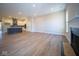 Open concept living room and kitchen with hardwood floors at 7942 Beaumont Green Pl, Indianapolis, IN 46250