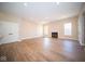 Spacious living room with hardwood floors and fireplace at 7942 Beaumont Green Pl, Indianapolis, IN 46250