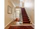Grand staircase with ornate runner at 6463 N Illinois N St, Indianapolis, IN 46260
