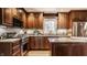 Modern kitchen featuring granite countertops and stainless steel appliances at 6463 N Illinois N St, Indianapolis, IN 46260
