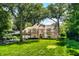 Two story brick home with attached garage and large yard at 6463 N Illinois N St, Indianapolis, IN 46260