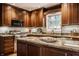 Spacious kitchen with an island and breakfast bar at 6463 N Illinois N St, Indianapolis, IN 46260