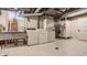 Unfinished basement with laundry hookups and storage area at 6463 N Illinois N St, Indianapolis, IN 46260
