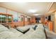 Spacious basement recreation area with sectional sofa and TV at 409 W Lakeview Dr, Nineveh, IN 46164