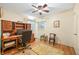 Bright home office with built-in desk and hardwood floors at 409 W Lakeview Dr, Nineveh, IN 46164