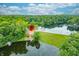 Aerial view of lake house and surrounding area at 409 W Lakeview Dr, Nineveh, IN 46164