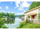 Lakefront home with a red door and a white picket fence, offering tranquil water views at 409 W Lakeview Dr, Nineveh, IN 46164
