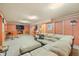 Finished basement featuring a sectional sofa and a fireplace at 409 W Lakeview Dr, Nineveh, IN 46164