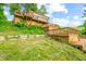 Lakefront home with wooden decks and lush greenery at 409 W Lakeview Dr, Nineveh, IN 46164